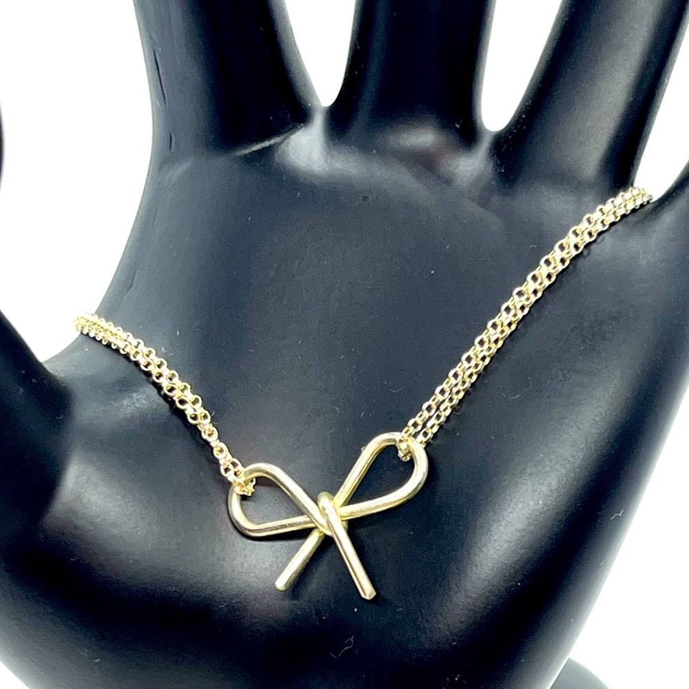 Sterling silver bow forget me knot dainty chain bracelet